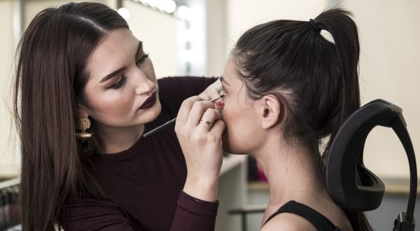 cute-make-up-artist-working