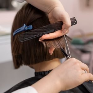 woman-getting-treatment-hairdresser-shop_23-2149229816